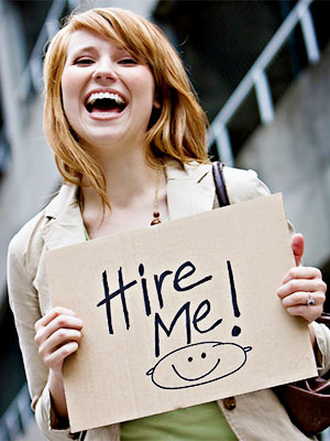 Woman with Hire Me Placard