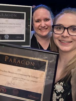 Kate Kirkpatrick and Barrie Fenton proudly show off the Silver and Bronze Paragon Awards.