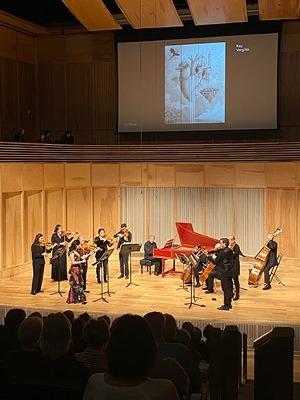 The Reno Chamber Orchestra performs 'La Furstemberg' while Kaylee Vergilio's enchanting artwork airs on the screen above.