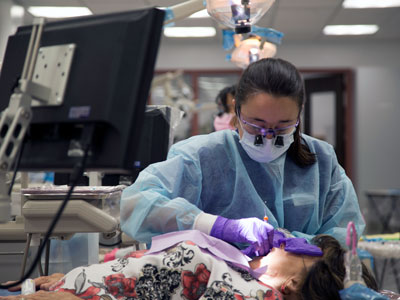 Photo of dental hygienist and patient