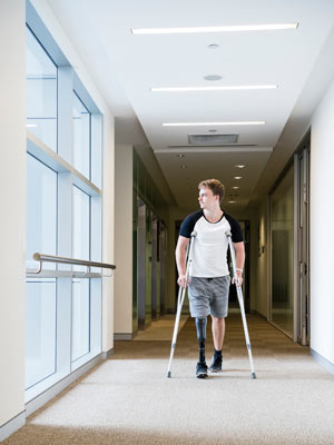 Man on Crutches Photo