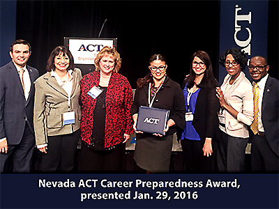 Image of Student Services Staff Accepting ACT Award