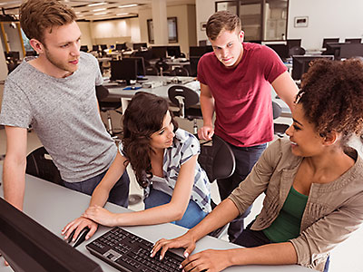 Image of Students Working Together by Computer