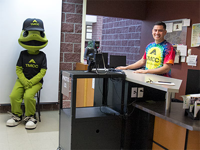 Student Employee with Wizard the Lizard Image
