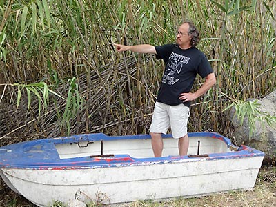 Bill Gallegos Standing in a Boat Image