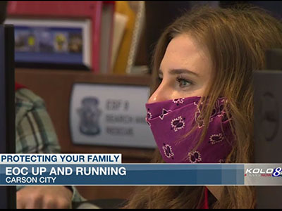 Lacee Gardner appears in a news report while wearing a mask.