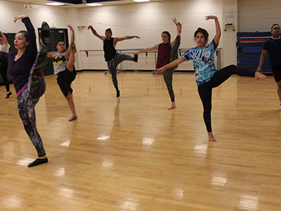 Students practicing in a dance class.