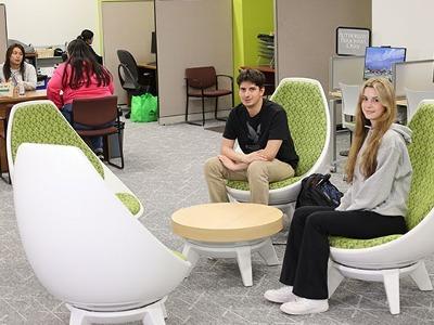 Students sit comfortably in the remodeled Admissions and Records Office.