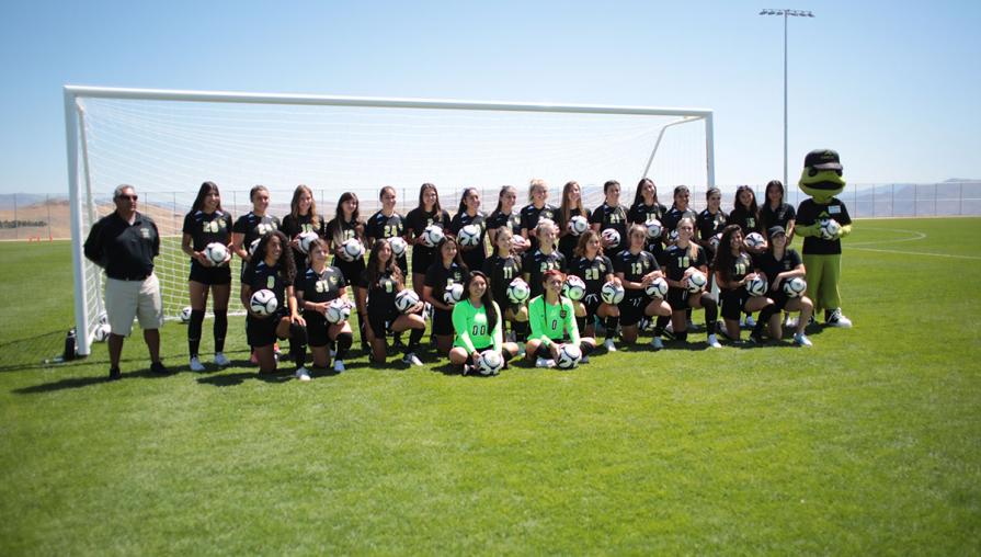 The TMCC Women’s Soccer team with Wizard. 
