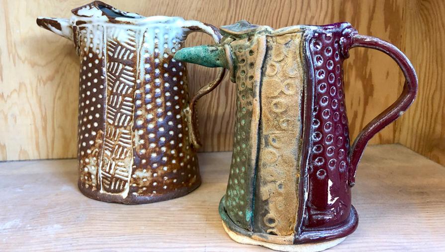 Two ceramic pitchers.