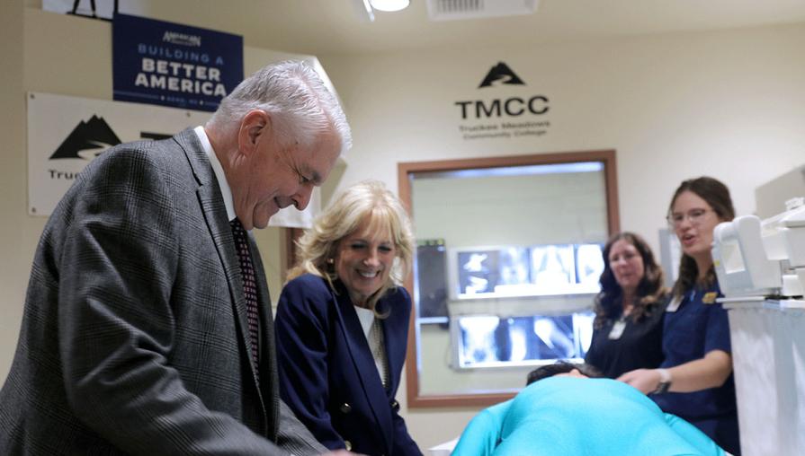 Governor Sisolak and Dr. Jill Biden speak with nursing students.
