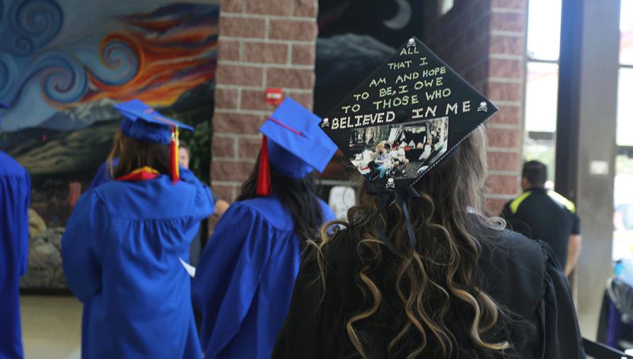 Many students observed a longtime tradition of decorating their caps.