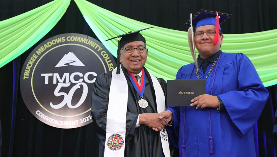 President's Medal Recipient Chairman Arlan Melendez poses with a graduate from the Reno-Sparks Indian Colony.