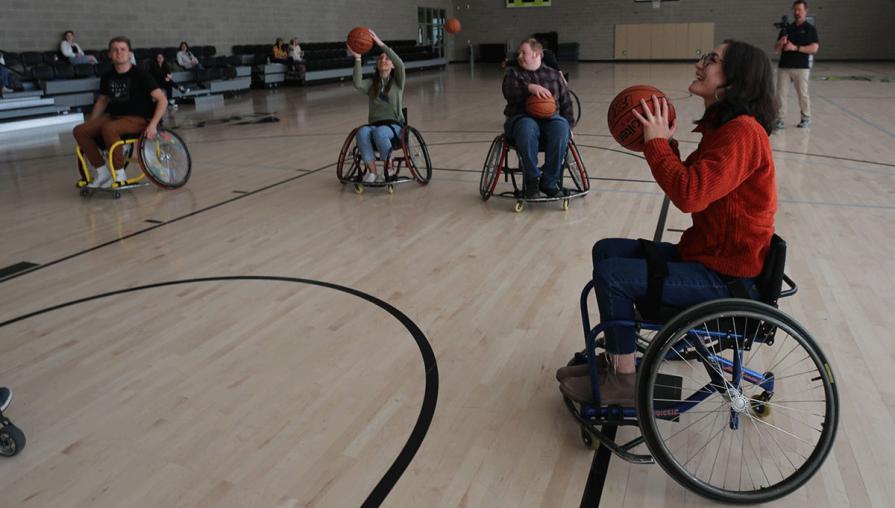 Students joined the Silver State Highrollers to learn how to play wheelchair basketball.