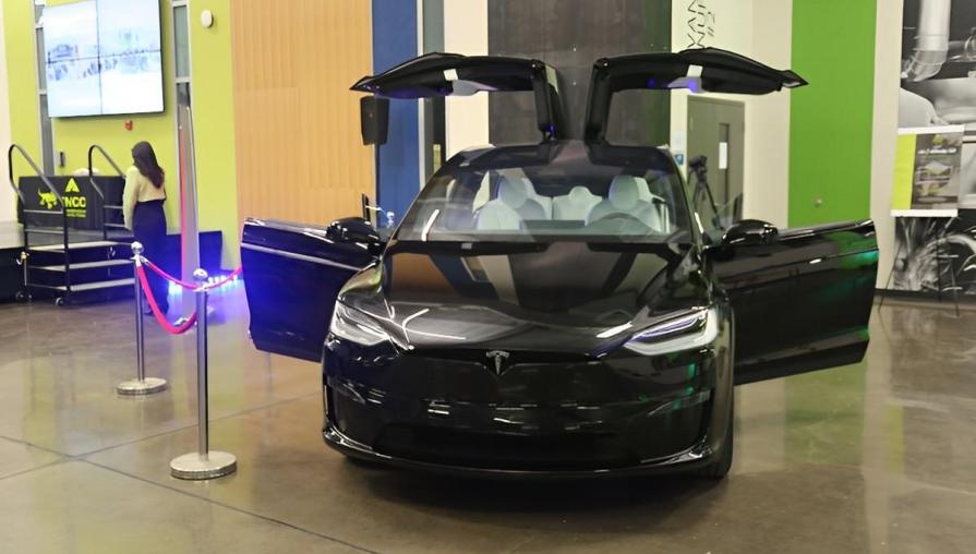 Black Tesla car that was available to examine during the celebration.