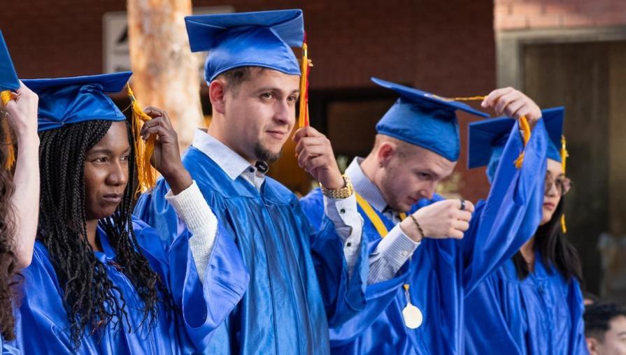 Graduates move their tassels to the left to signify they've completed their high school equivalency and are ready for the next chapter in their lives.