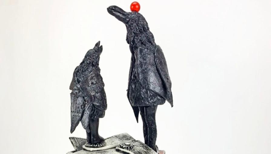 Two crows, one tall and the other short, stand atop newspaper clippings and gaze up at the sky. Terminus and Telos, by Candace Garlock.