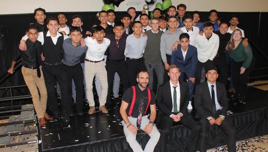 The Men's Soccer team gathers for a group photo.