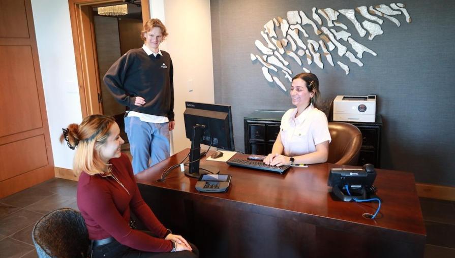 Hospitality students play the role of the concierge in a luxury customer experience.