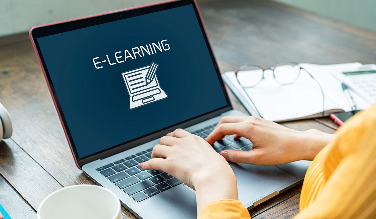 Laptop screen with the words 'e-learning'.