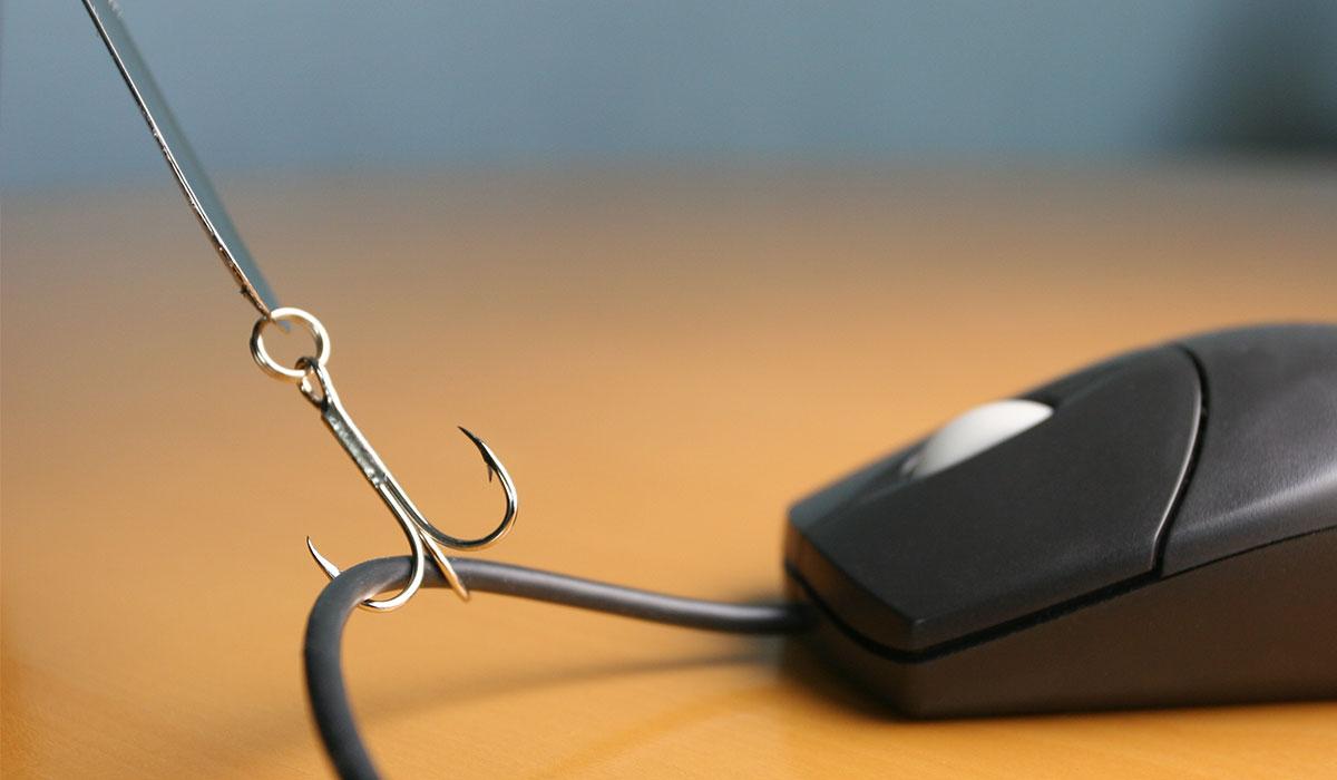 Graphic of a fishing hook pulling a computer mouse.