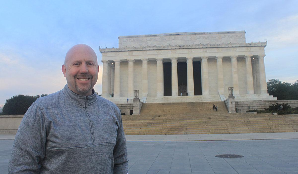 EMHS Part-time faculty Chris Smith in front of the Lincoln Memorial in Washington D.C. 