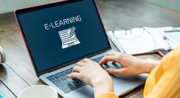 Laptop screen with the words 'e-learning'.