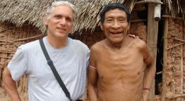 Professor Louis Forline poses with the Awá, Karapiru