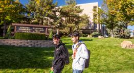 Two students walking at the Dandini Campus.