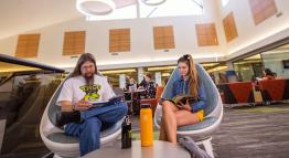 students reading in the learning commons
