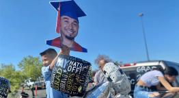 Salvador Romero's son celebrates his father crossing the commencement stage in 2021