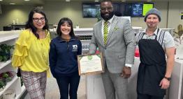 Dr. Karen Hilgersom and Dr. Ayo Akinola present Nevada Green Dining Certificate in Café Verde.