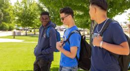 Three TMCC students enjoy each other's company while walking through the plaza on a beautiful summer day.