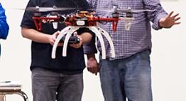 Student and Teacher Using Drone