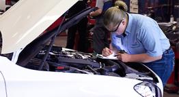 Student Working on Car